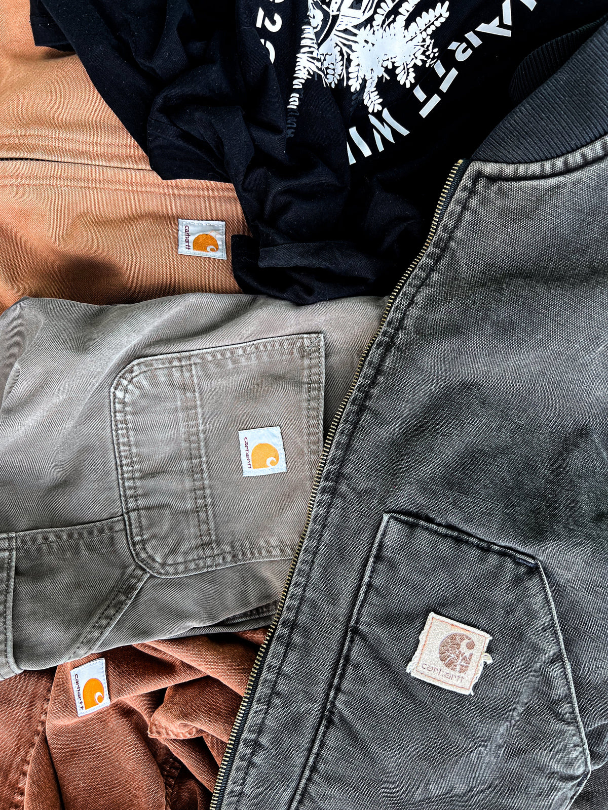 Relic Runs vintage selection showcasing a mix of graphic tees and layered pieces in a fast-moving drop