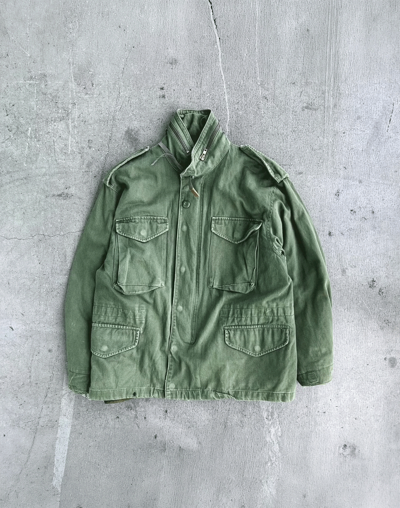 Animated view of a worn green military field jacket for Balanced Outskirts Vol. 001.
