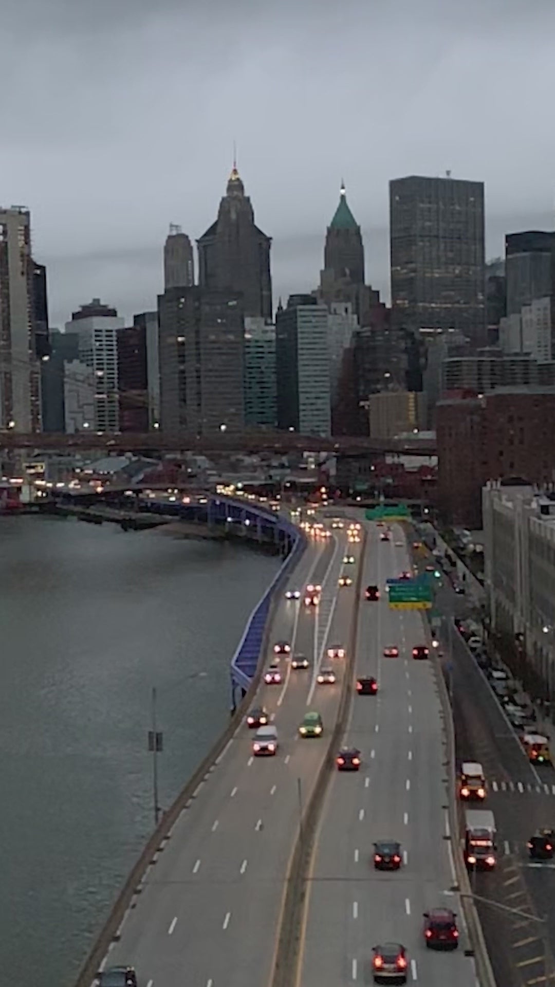 City skyline and highway at dusk from the Balanced Outskirts film.